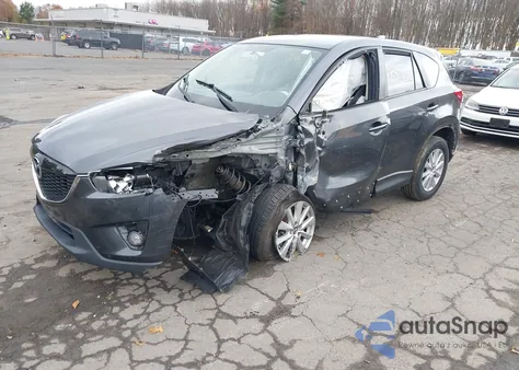 2014 Mazda Cx-5 Touring z USA, uszkodzony, nr VIN JM3KE4CY4E0411631